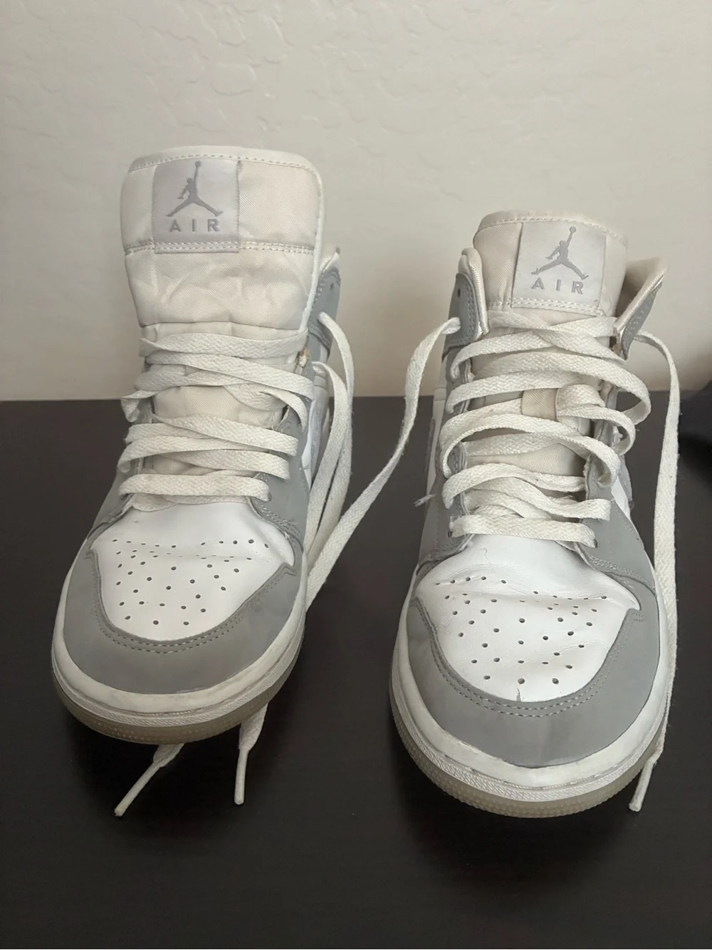 Jordan Women’s High-Top Sneakers in White and Light Gray